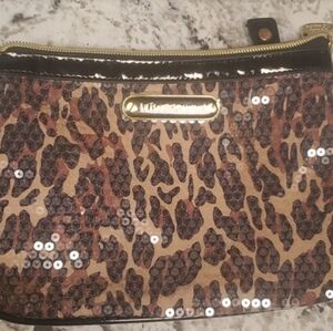 Betsey Johnson Animal Print Sequin Make Up Cosmetic Wristlet Bag rounded bottom.